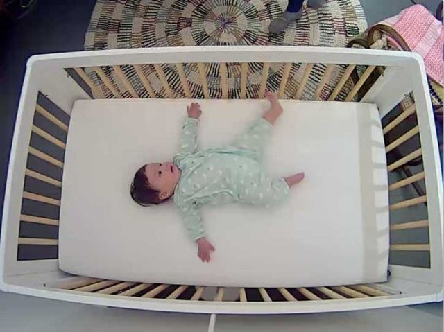 baby-in-crib-nanit-650x486.jpg