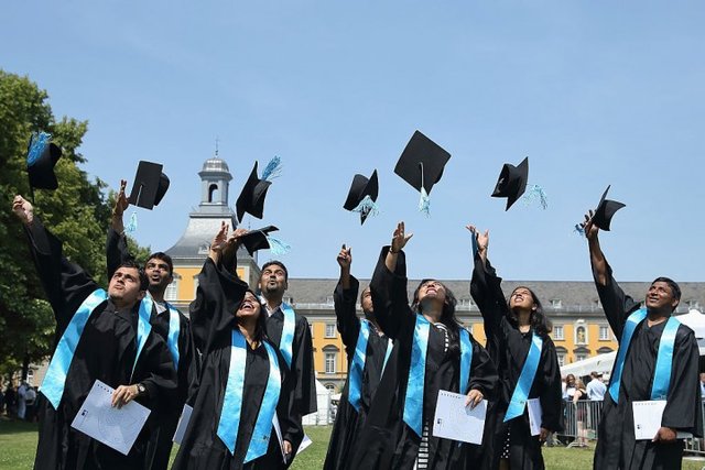 college-graduates-celebrate-achieving-their-bachelors-degree.jpg