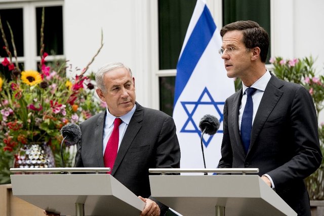 نتانیاهو در هلند آمادگی خود را برای مذاکره بدون شرط با عباس اعلام کرد