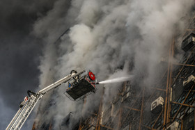 آتش سوزی در ساختمان پلاسکو در تقاطع خیابان جمهوری اسلامی و فردوسی   