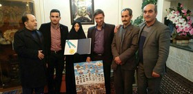 نصیری طلای جام جهانی کشتی را به مادر شهید شهریاری اهدا کرد