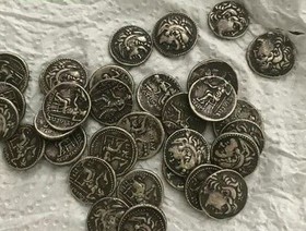 کشف ۱۵۰۰ سکه ایرانی و خارجی در اسدآباد