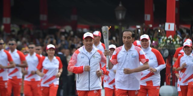 مراسم حمل مشعل بازی‌های آسیایی در روز استقلال اندونزی + تصاویر