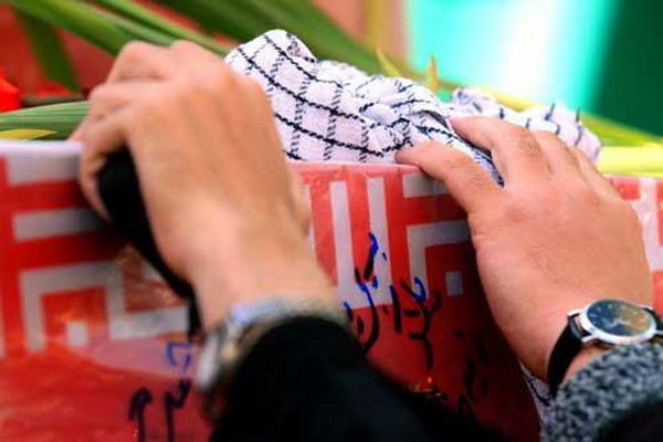 تشییع پیکرهای ۹ شهید گمنام دفاع مقدس در اهواز 