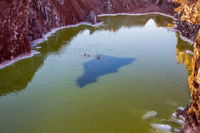 Qom Salt Dome is seen in the photo, Qom, Iran, July 27, 2019.
The water of its small lake is believed to have health benefits so that people from Qom and other cities throughout Iran go to this tourist attraction, especially in summers in order to spend time with their family in this beautiful scenery and benefit from the healing features of its water.