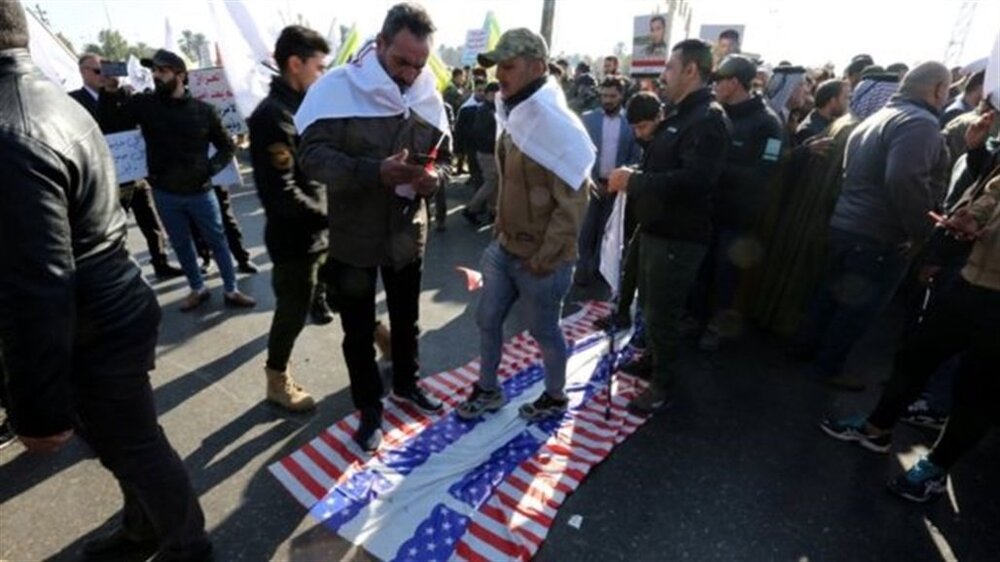 حشد شعبی از معترضان خواست اطراف سفارت آمریکا در بغداد را ترک کنند