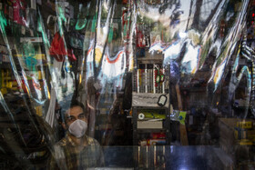 رعایت فاصله اجتماعی توسط  کسبه منطقه ۸ تهران درپی شیوع ویروس کرونا