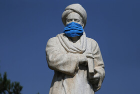 آغاز طرح ماسک اجباری در همدان - ماسک بر مجسمه بوعلی سینا نماد مبارزه با کرونا