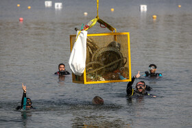 پاکسازی دریاچه آزادی توسط فدراسیون های قایقرانی و  نجات غریق و غواصی