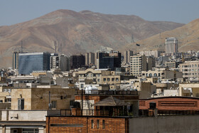 نمای از ساختمان سازمان بورس اوراق بهادار در سعادت آباد و هتل اسپیناس پالاس واقع در میدان بهرود که در شمال محله سعاد آباد قرار دارد.