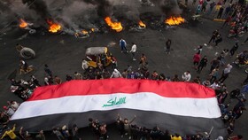 کشته شدن یک پلیس عراقی و زخمی شدن ۳۳ تن در اعتراضات ذی‌قار