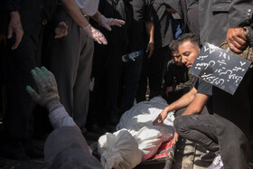 مراسم خاکسپاری فتحعلی اویسی