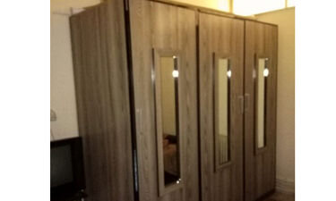 عکس تزئینی است فیلمبرداری از زنان در اتاق پرو فروشگاهی در شهرک غرب تهران