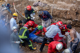 ریزش آوار ساختمانی و محبوس شدن دو کارگر - قم