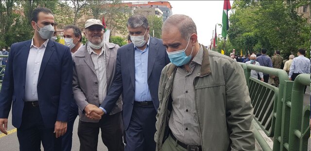 حضور رییس سازمان انرژی اتمی ایران در راهپیمایی روز قدس در تهران

