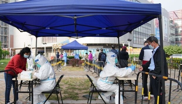 ثبت رکورد جدیدِ ابتلای روزانه به کرونا در چین ثبت رکورد جدیدِ ابتلای روزانه به کرونا در چین