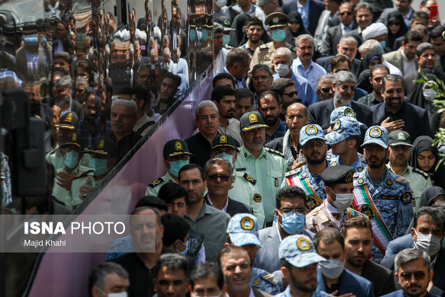 خاکسپاری پیکرهای دو شهید گمنام در مجموعه ورزشی انقلاب تهران