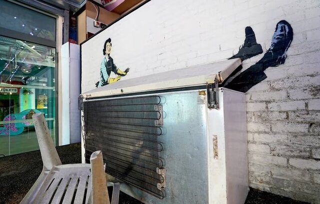 گرافیتی پرحاشیه را جای دیگر بردند