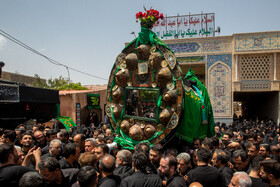 آیین سنتی نخل گردانی روز عاشورا در روستای دستگرد قم