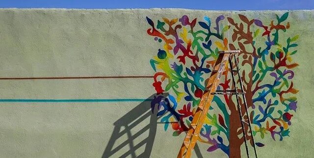 عکس خبر تزیینی است شعر فارسی روی دیواره خیابان امیرکبیر+عکس