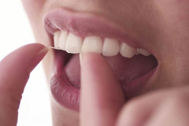 علت لق شدن دندان ها - درمان و پیشگیری