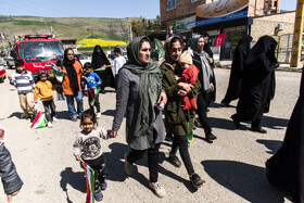 حضور خانواده ترابی در راهپیمایی روز قدس در شهر فریم که در نزدیکی روستای دینه سر است