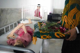 مراسم استقبال از پرچم متبرک حرم امام رضا در مرکز نگهداری ازمعلولین  جسمی و ذهنی زنده یاد نوشیروانی