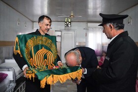مراسم استقبال از پرچم متبرک حرم امام رضا در مرکز نگهداری ازمعلولین  جسمی و ذهنی زنده یاد نوشیروانی