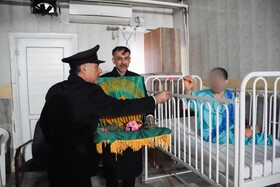 مراسم استقبال از پرچم متبرک امام رضا در مرکز نگهداری از معلولین جسمی و حرکتی زنده یاد نوشیروانی