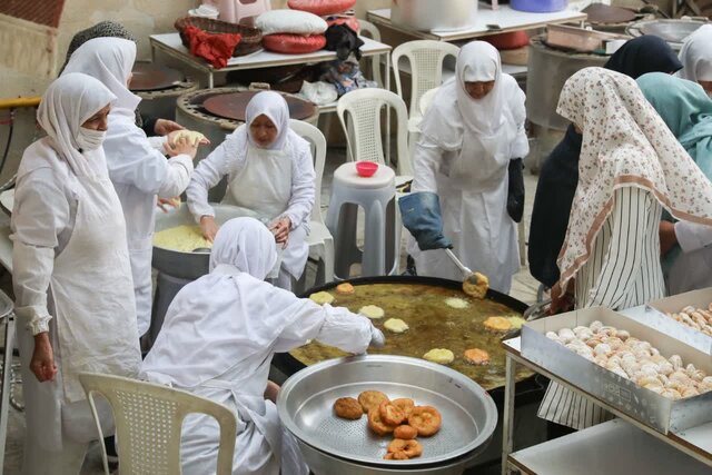 پذیرایی کرمانیها در کوچههای مشهدالرضا