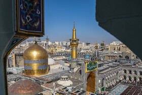 آیین تعویض پرچم گنبد حرم مطهر رضوی