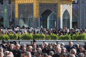 آیین تعویض پرچم گنبد حرم مطهر رضوی