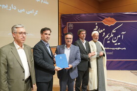 اهدای حکم محمد حسن‌زاده به عنوان سرپرست دانشگاه محقق اردبیلی