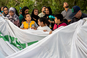 اهتزاز بزرگترین پرچم علوی