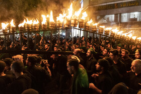 آیین مشعل گردانی در شب تاسوعا‎ - مشهد