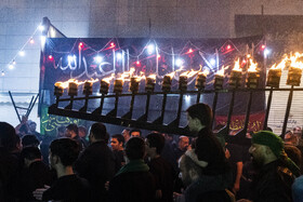 آیین مشعل گردانی در شب تاسوعا‎ - مشهد