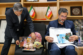 علیرضا صدیقی، برادر شهید دانشمند هسته‌ای در آستانه اشرفیه در نشست خبری سخنگوی وزارت امور خارجه