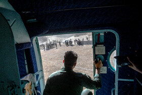 در زمان برگشت و رسیدن به روستای الیت، داوطلبین دیگر در انتظار رسیدن بالگرد بودند تا به منطقه اصلی حریق اعزام شوند.