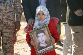 مراسم تشییع و تدفین پیکر مطهر شهید گمنام ۱۸ساله دفاع مقدس در همدان