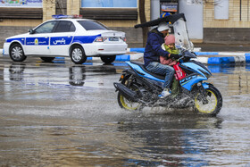 بارش باران و آبگرفتگی معابر در کرمان
