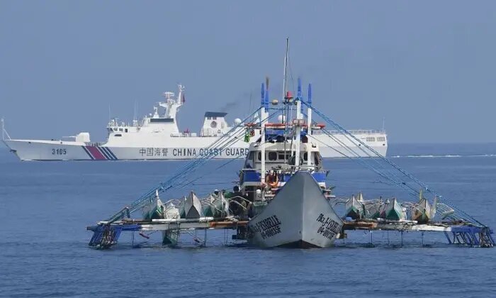 China military conducts drills near disputed South China Sea reef