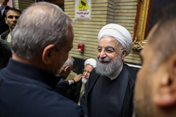 حسن روحانی و مسعود پزشکیان در مراسم ختم احمد ناطق نوری