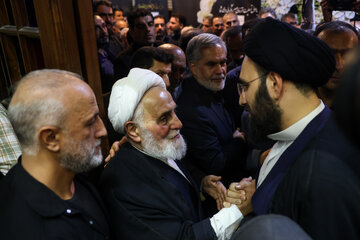سید علی خمینی و علی اکبر ناطق نوری در مراسم ختم احمد ناطق نوری
