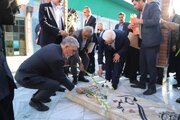 غبارروبی گلزار شهید گمنام در بجنورد با حضور وزیر ارشاد و معاون رئیس جمهوری