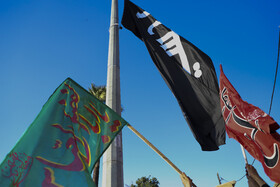 مراسم برافراشته شدن پرچم امام حسین (ع)  در بین الحرمین شیراز
