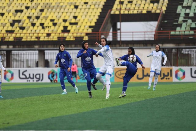 بُرد بانوان ملوان با گلهای زلفی و چترنور