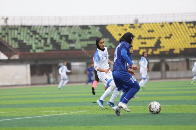 بُرد بانوان ملوان با گلهای زلفی و چترنور