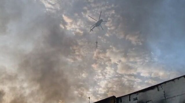 پرواز بالگرد کمکی برای اطفای حریق مجتمع ونوس پرواز بالگرد کمکی برای اطفای حریق مجتمع ونوس