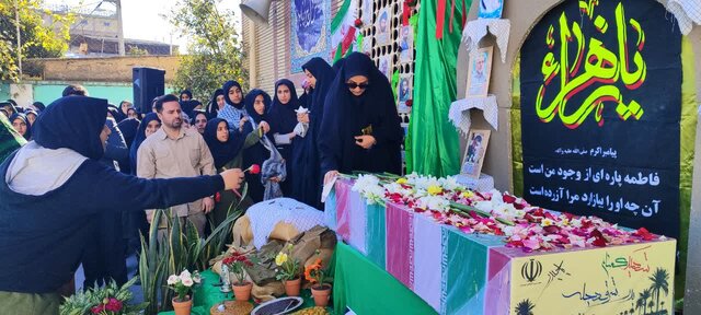 پیکر شهید گمنام دفاع مقدس در آغوش آینده سازان فردا