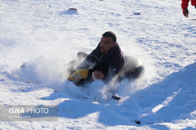 /گزارش تصویری/ تیوب سواری تفریح زمستانی همدانی‌ها
